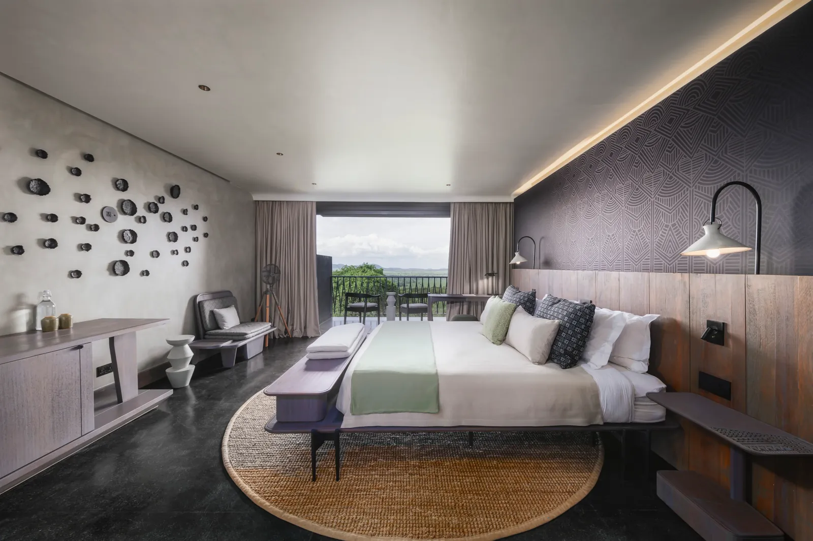 Luxury safari lodge suite interior with Serengeti plains view